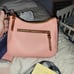 Dooney & Bourke Pale Pink Pebbled leather hobo and wristlet