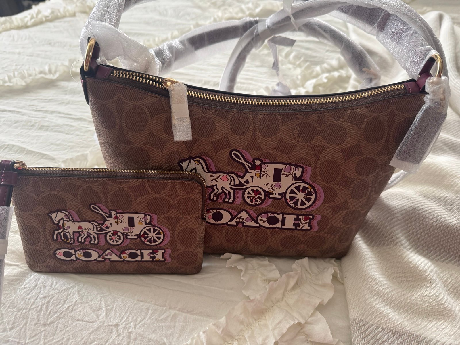Coach carriage shoulder bag / zip wristlet