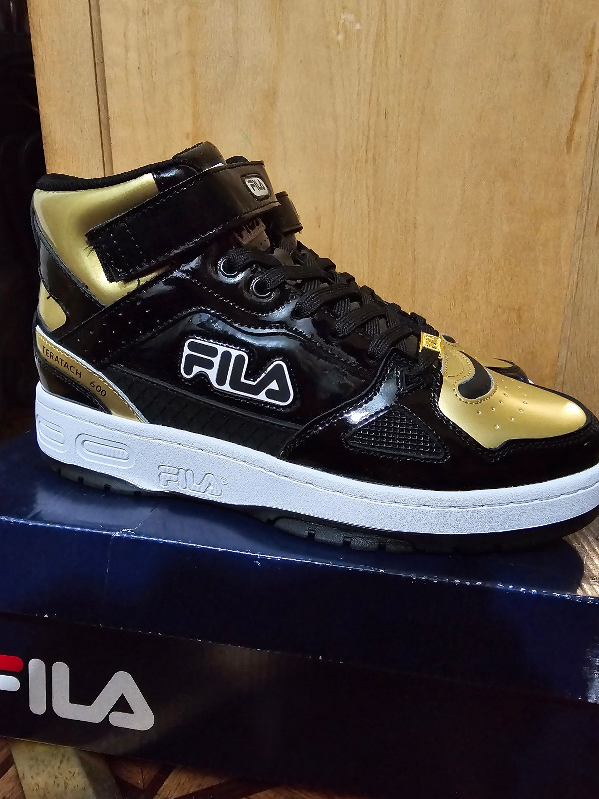 Rare Gold and Black Filas