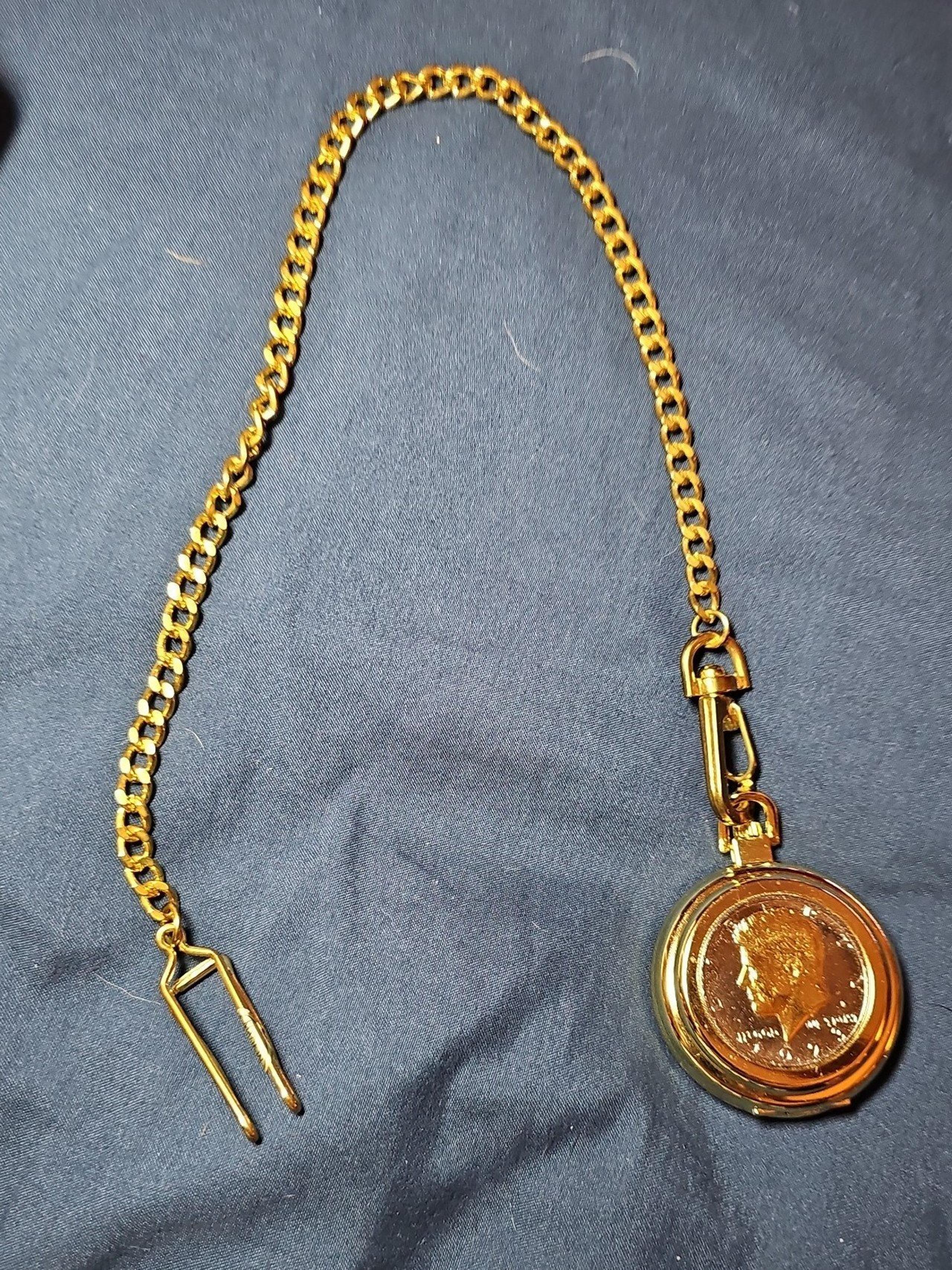 GENEVE JFK HALF DOLLAR 1973 COIN POCKET WATCH.