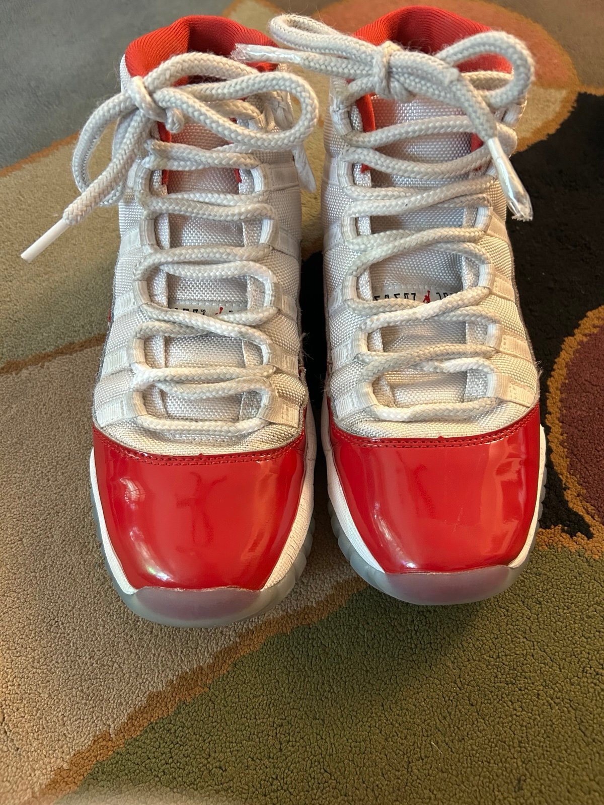 Jordan 11 “cherry red” Holiday