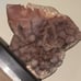 Pink amethyst face carving with custom stand
