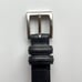 Coach men’s Size 38 black leather belt. Silver colored buckle. EUC