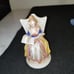 VINTAGE FIGURINES BLUE & WHITE FISHERMAN & TWO OTHER OCCUPIED JAPAN FIGURINES.