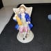 VINTAGE FIGURINES BLUE & WHITE FISHERMAN & TWO OTHER OCCUPIED JAPAN FIGURINES.
