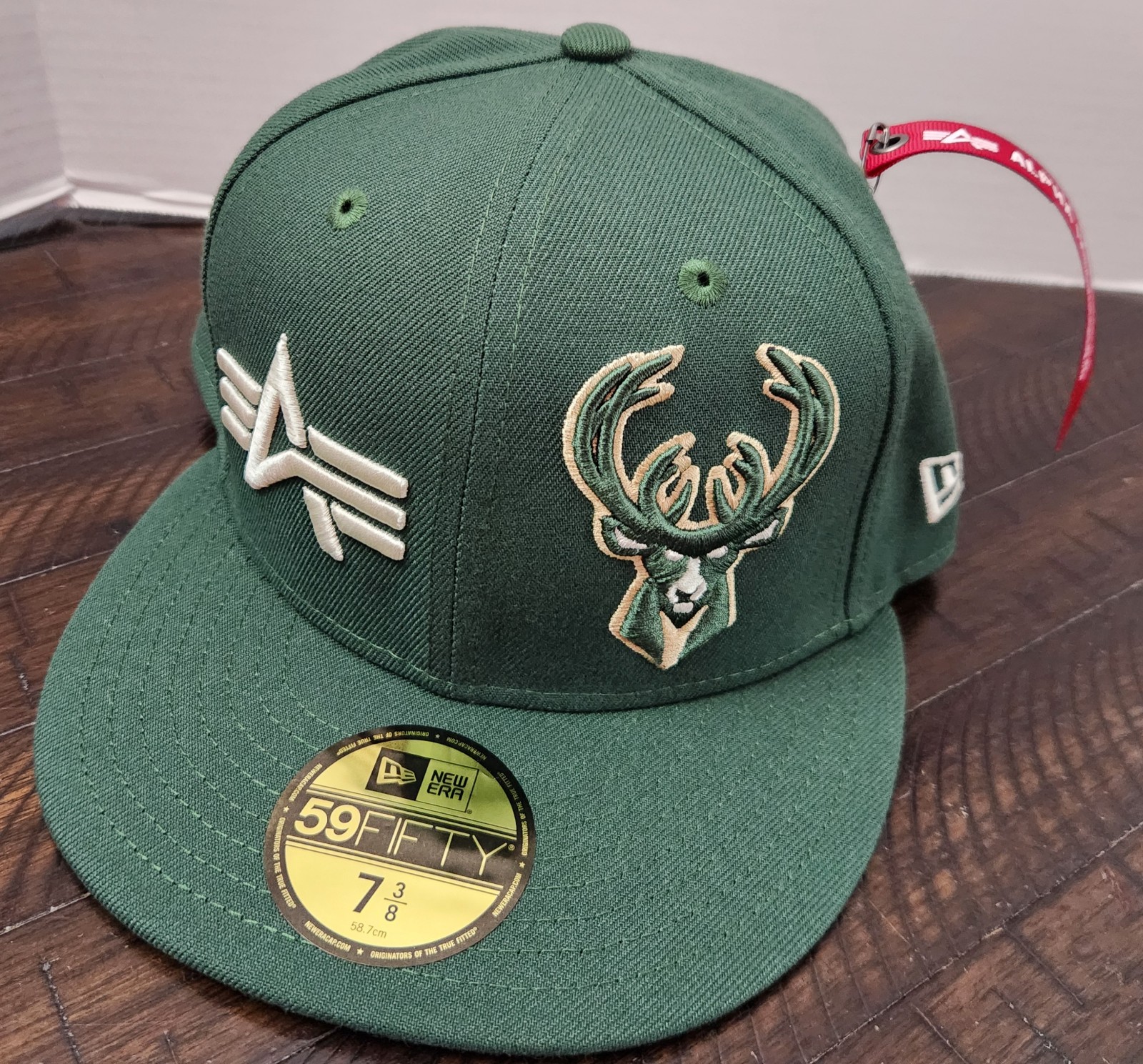 NWT New Era 59Fifty Alpha Industries Milwaukee Bucks Fitted Hat 7 3/8 Green.