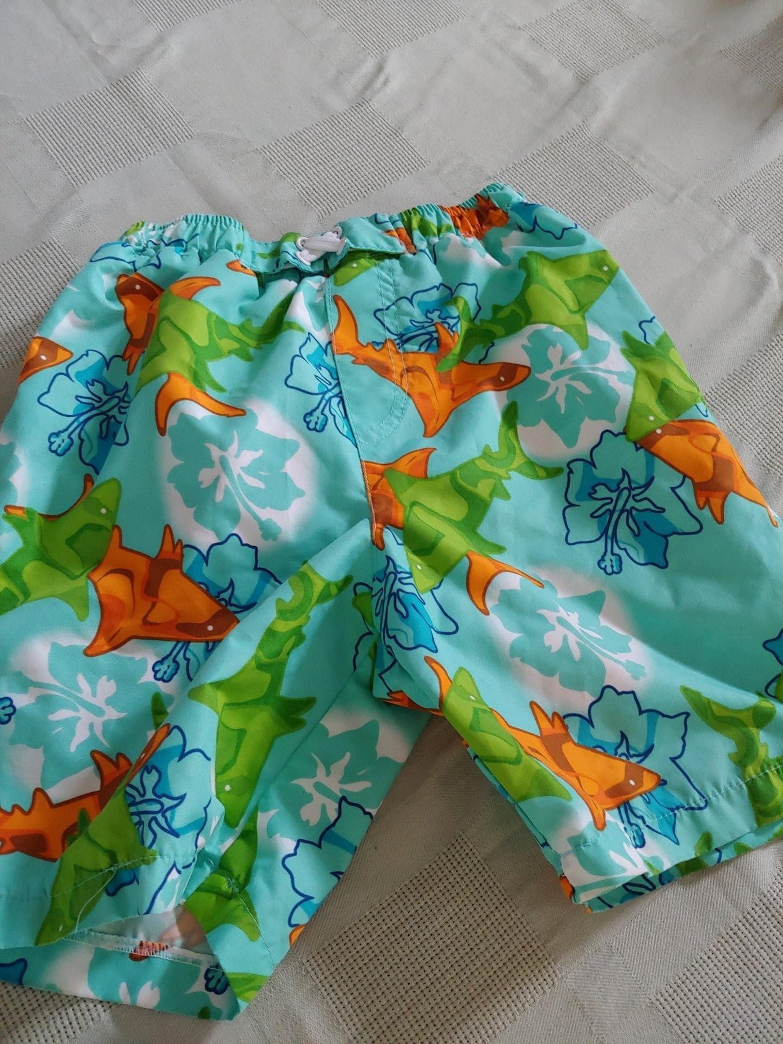 SHARK SWIM SUIT BOYS SIZE 6 BY BUNZ KIDS- LICENSED LINED PULLSTRING.
Shark print
