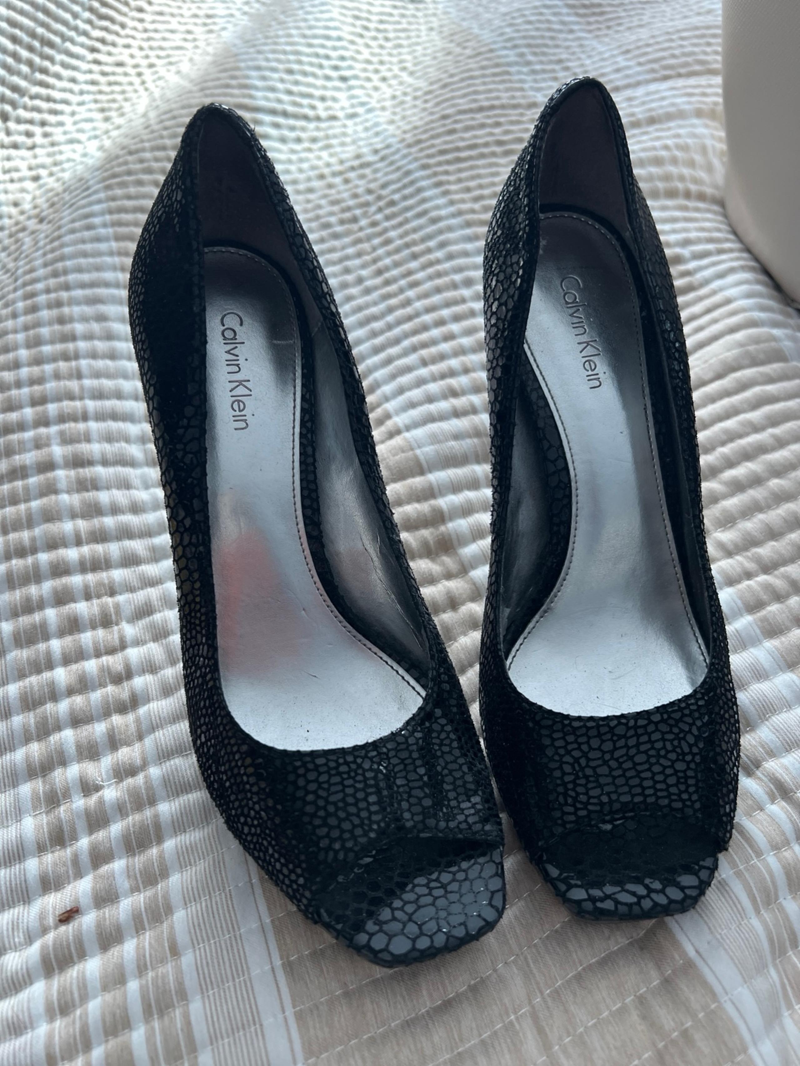 Black snake skin, Calvin Klein peep toe heels sz 7.