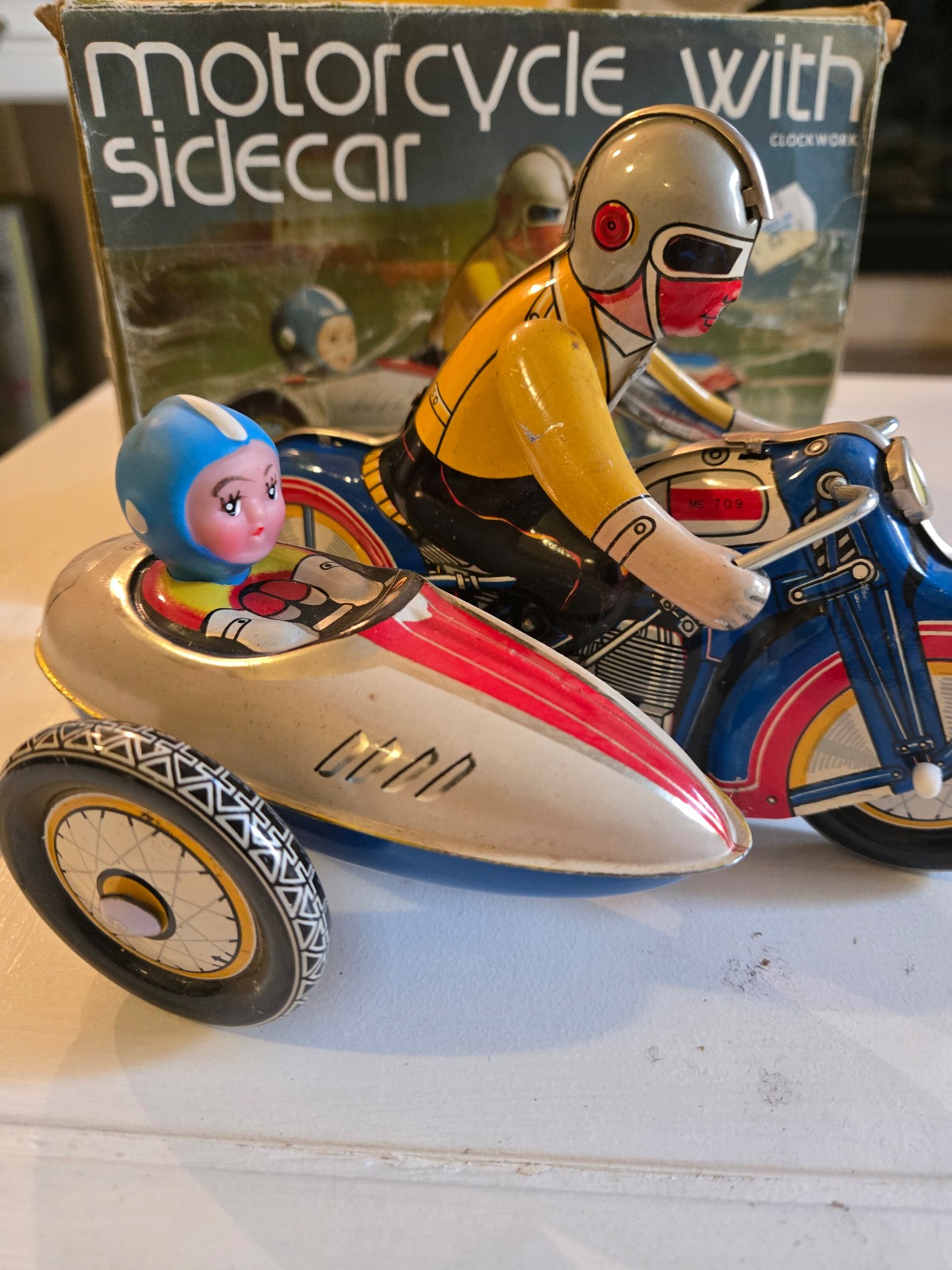 Vintage tin Motorcycle with sidecar in box