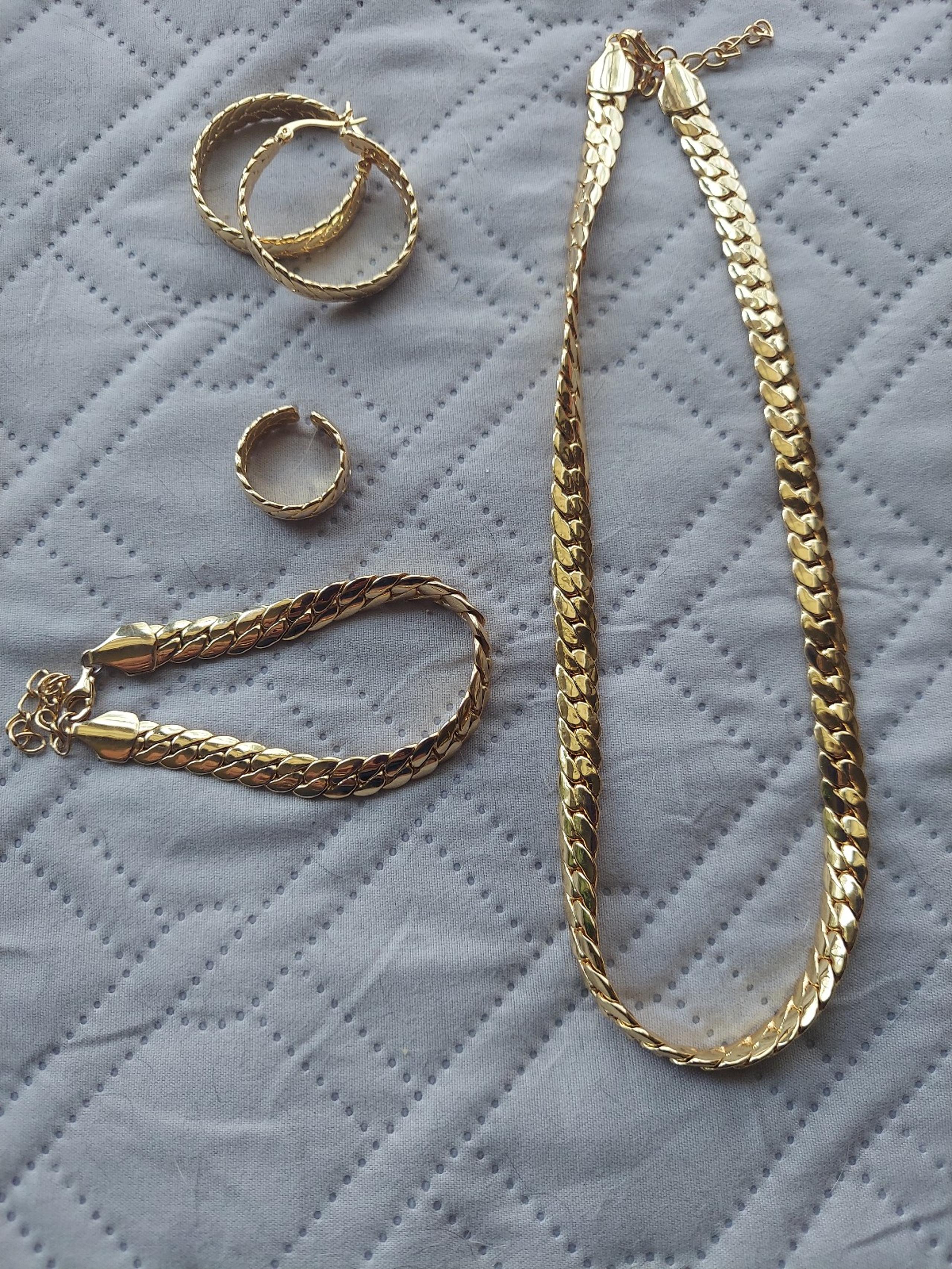 Set of earrings, necklace, bracelet ,ring on sterling silver, 14k. gold plated.