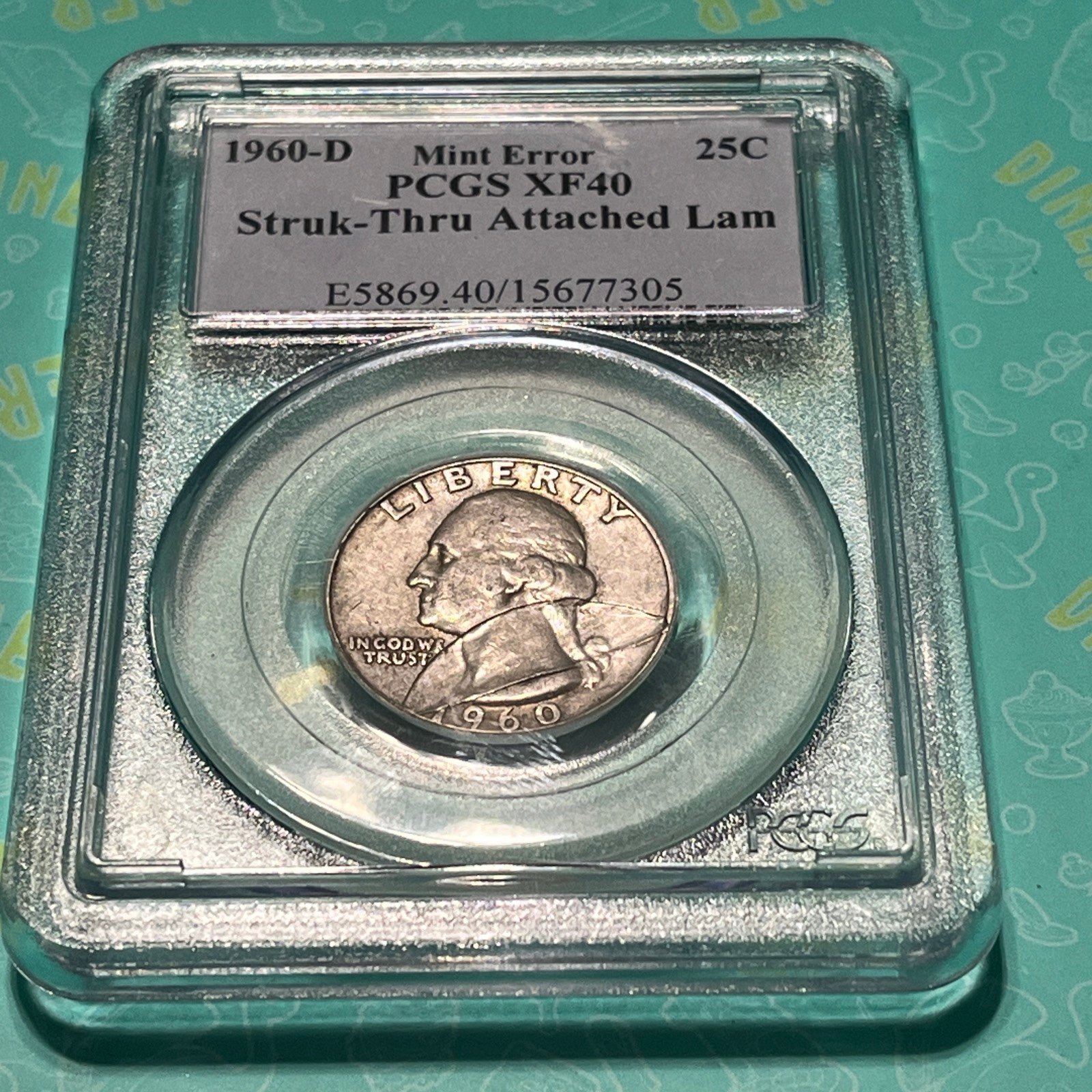 US COIN ERROR STRUCK THRU ATTACHED LAM 1960 Quarter