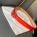 Orange red Bally leather belt.