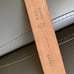 Orange red Bally leather belt.