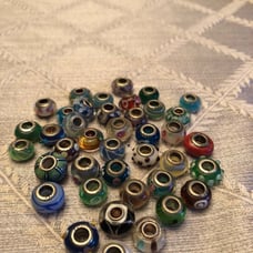 Silver and glass Pandora beads, varied c