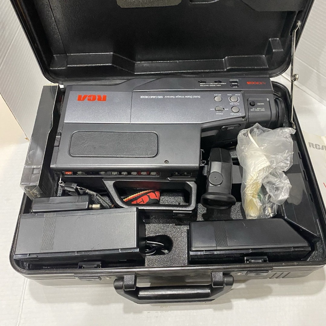 vintage RCA CC275 camcorder with its case and accessories Read