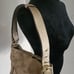 Coach Canvas Purse with Gold Straps and Lettering Leather Trim