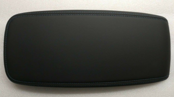 Chevy Volt 2016-19 black leather center console lid armrest. Blue stitching OEM