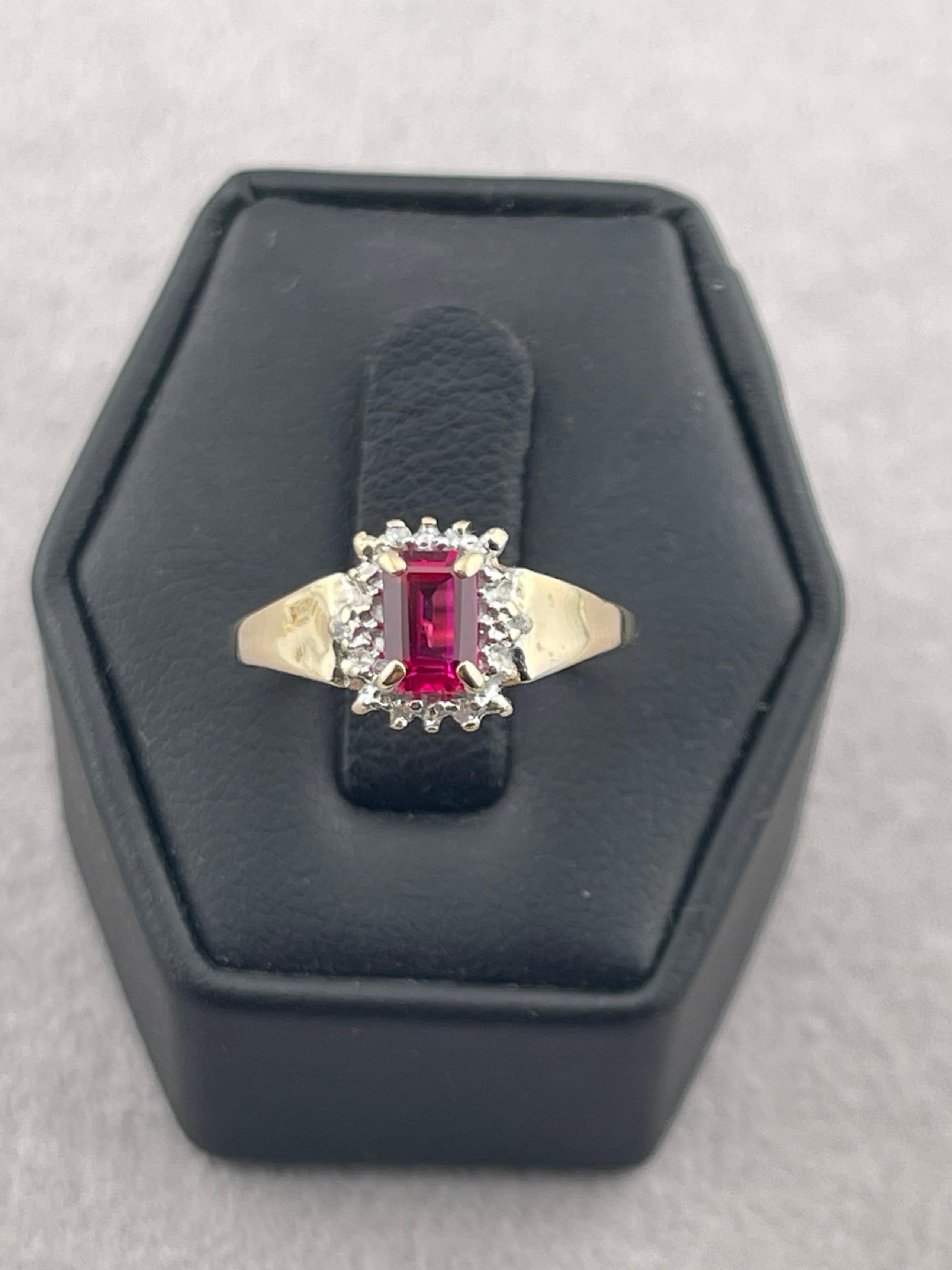 Vintage ruby and diamond halo ring 10 karat yellow gold