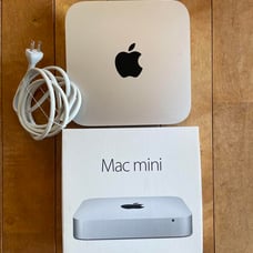 Apple Mac mini unit + power cable