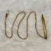 Vintage gold tone mechanical pencil with chain