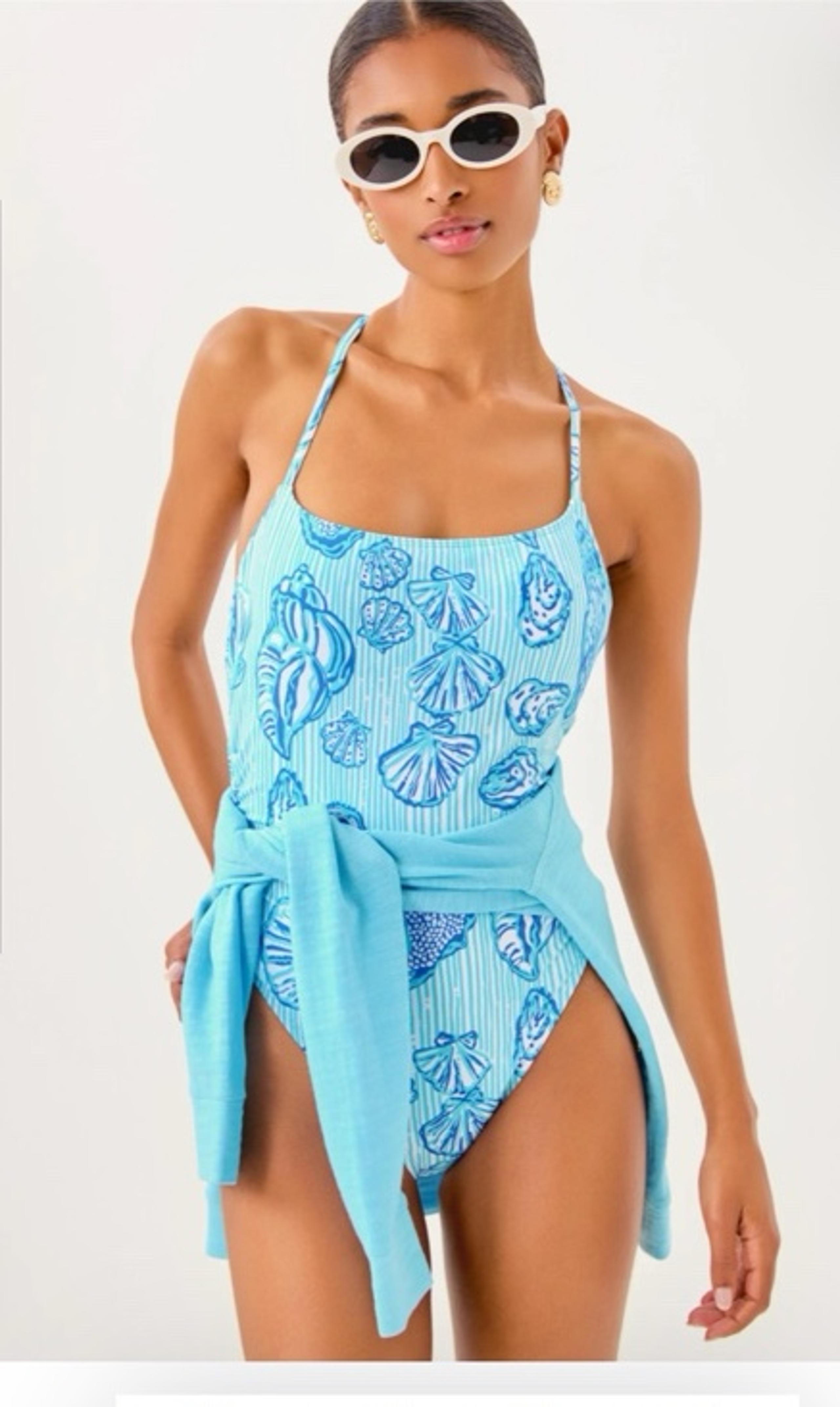 Lilly Pulitzer Vinita One Piece in
Fresh Water Blue. Size 10