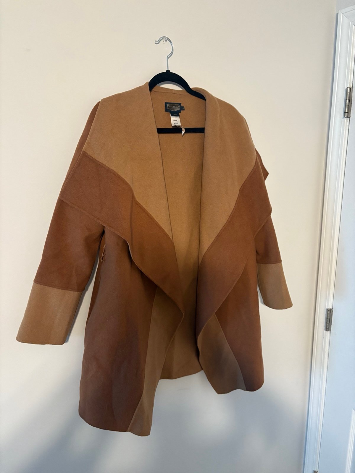 Women’s size medium Pendleton camel and brown jacket/wrap. Excellent condition.