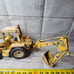 Vintage Ertl 1/16 International harvester diecast backhoe / loader yellow