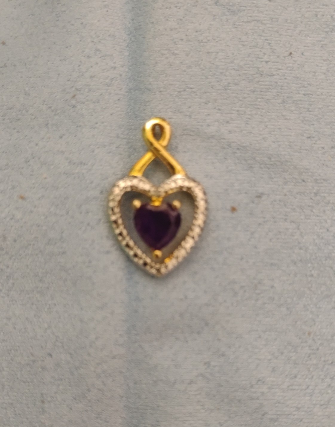 12 k gold and sterling silver heart pendant