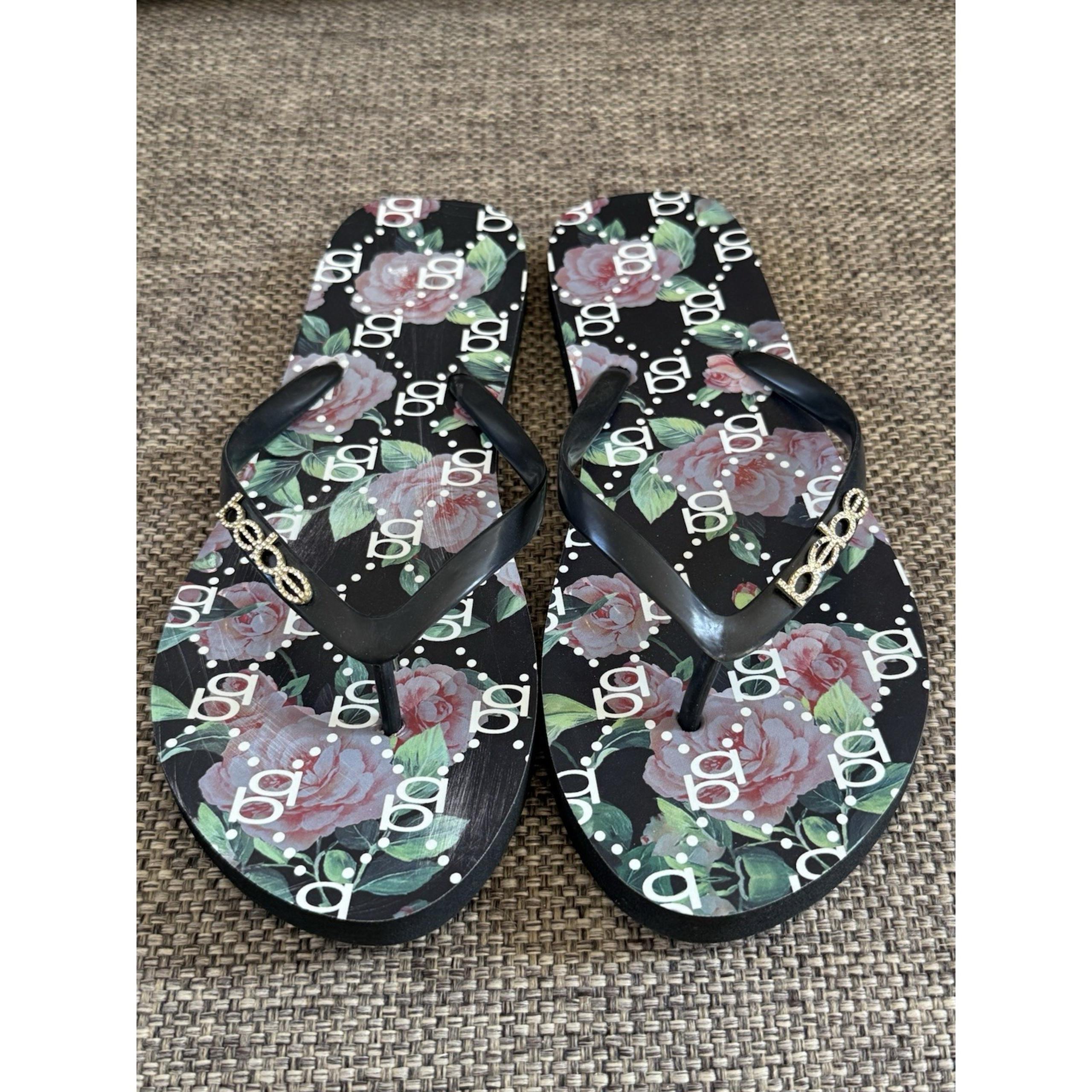 Bebe Women's Florissa Flip Flops Sandals in Black. Size 11