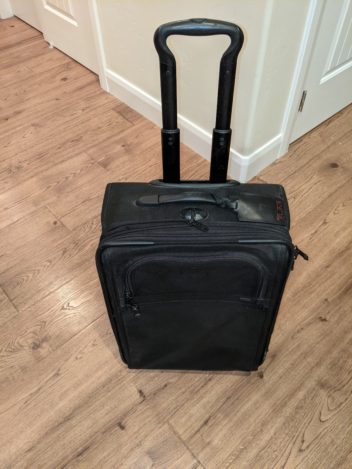 TUMI 2 wheeled rolling luggage