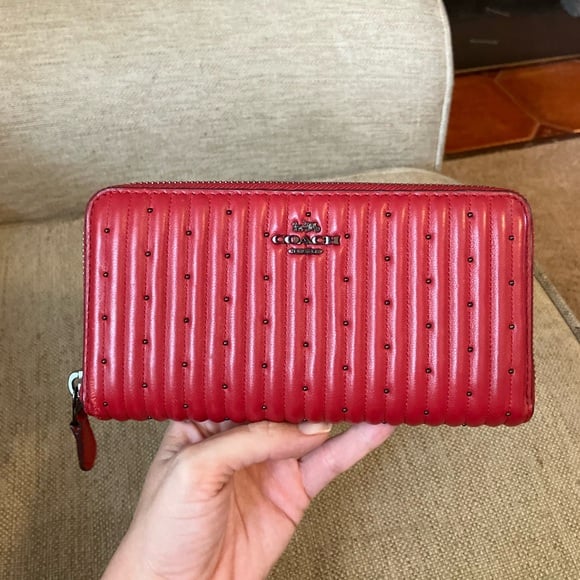 Coach red accordion zip quilted leather wallet with studs