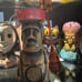 Oakwash Superstition Village Moai mug with coin
