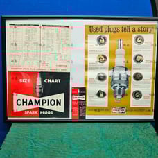 Champion sparkplug advertising lot in frame