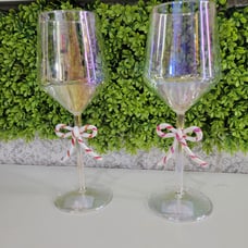 Candy cane bow wine glasses