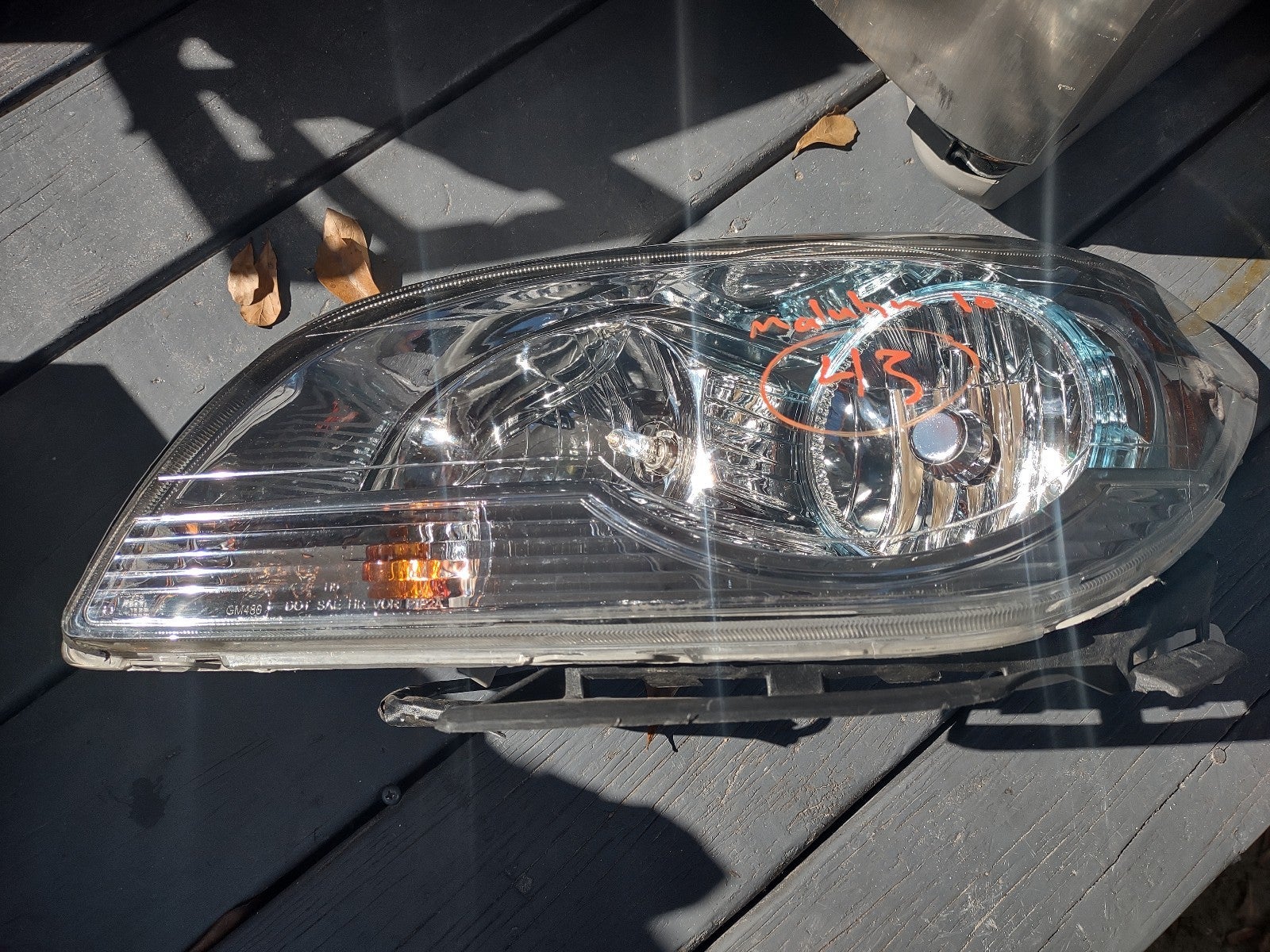 08 -2012 Chevy Malibu O.E.M.driver side headlight assembly (Read Description!!!)