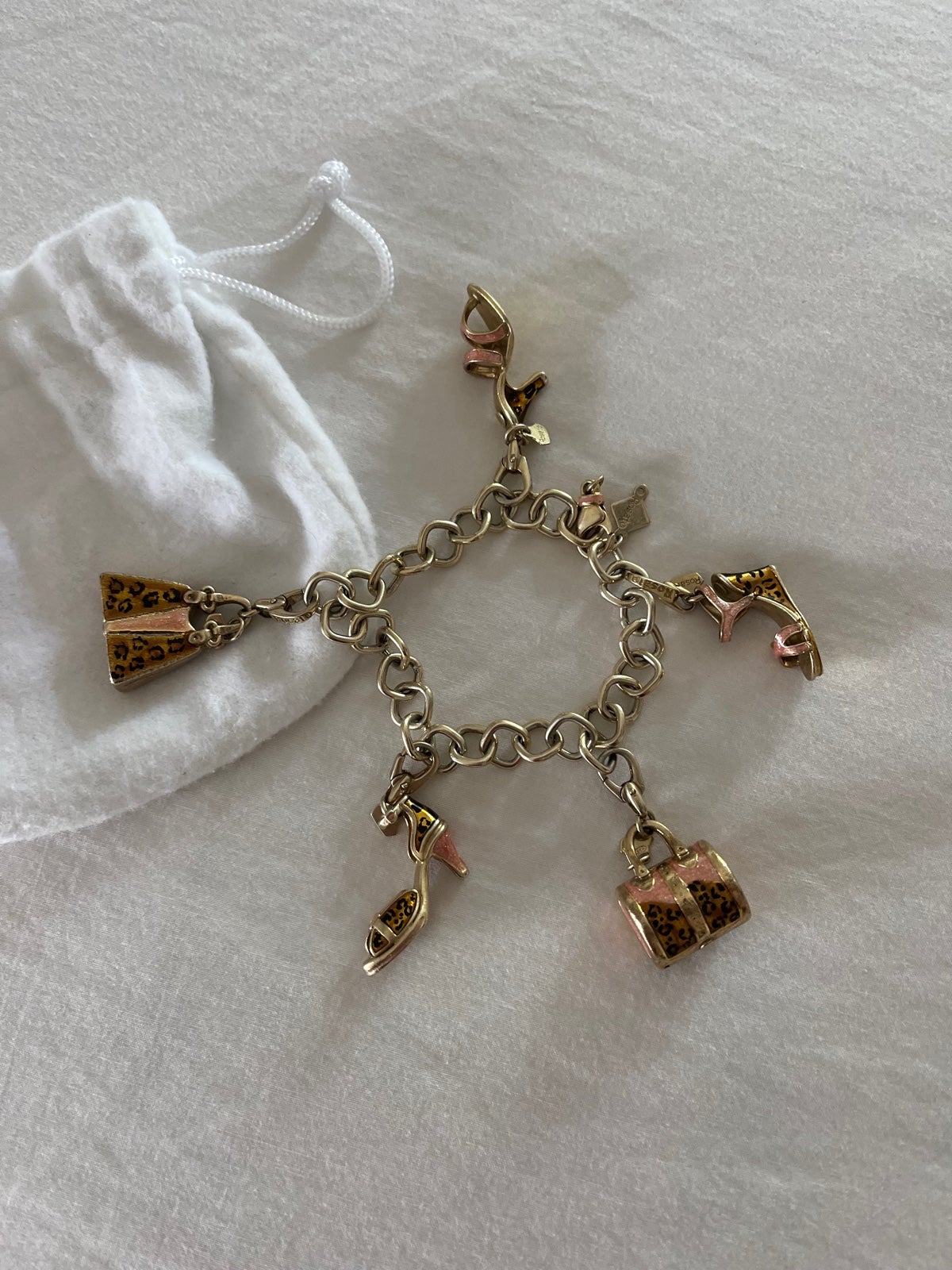 18k gold plated Rosato Bracelet with 5 collector charms.