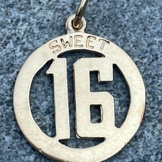 14K Yellow Gold “Sweet 16” Open Work Circle Charm