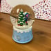 Rudolf Res Noses Reindeer Snow Globe Music Box