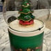 Under the Christmas tree candle