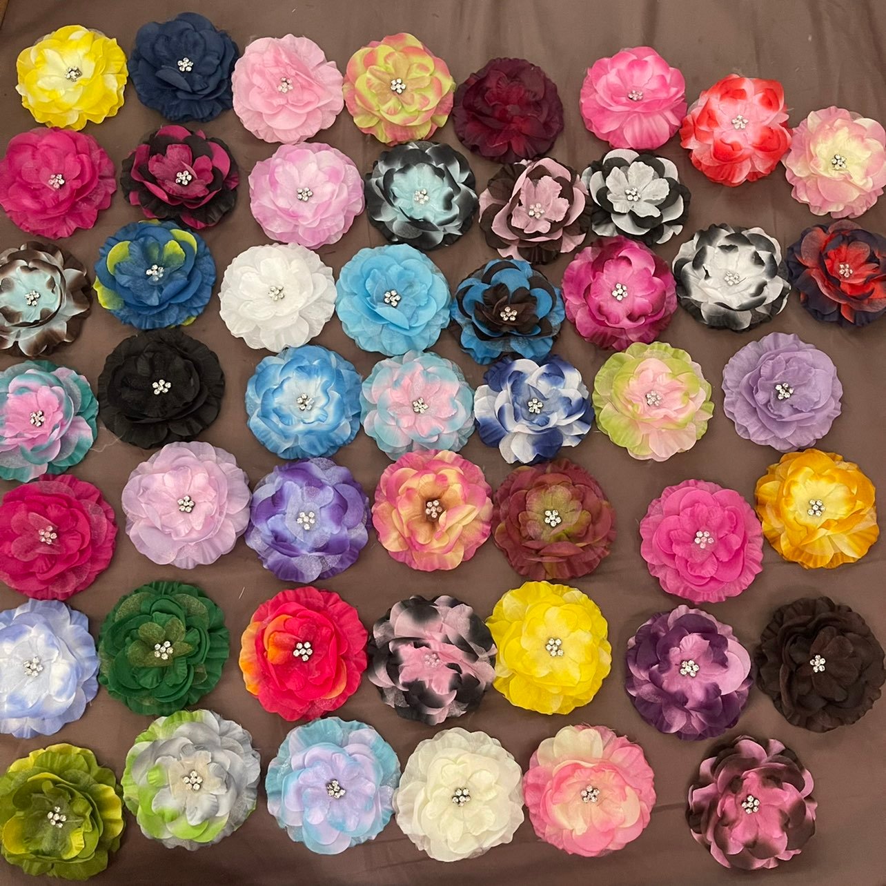 Silk flowers with rhinestones for art