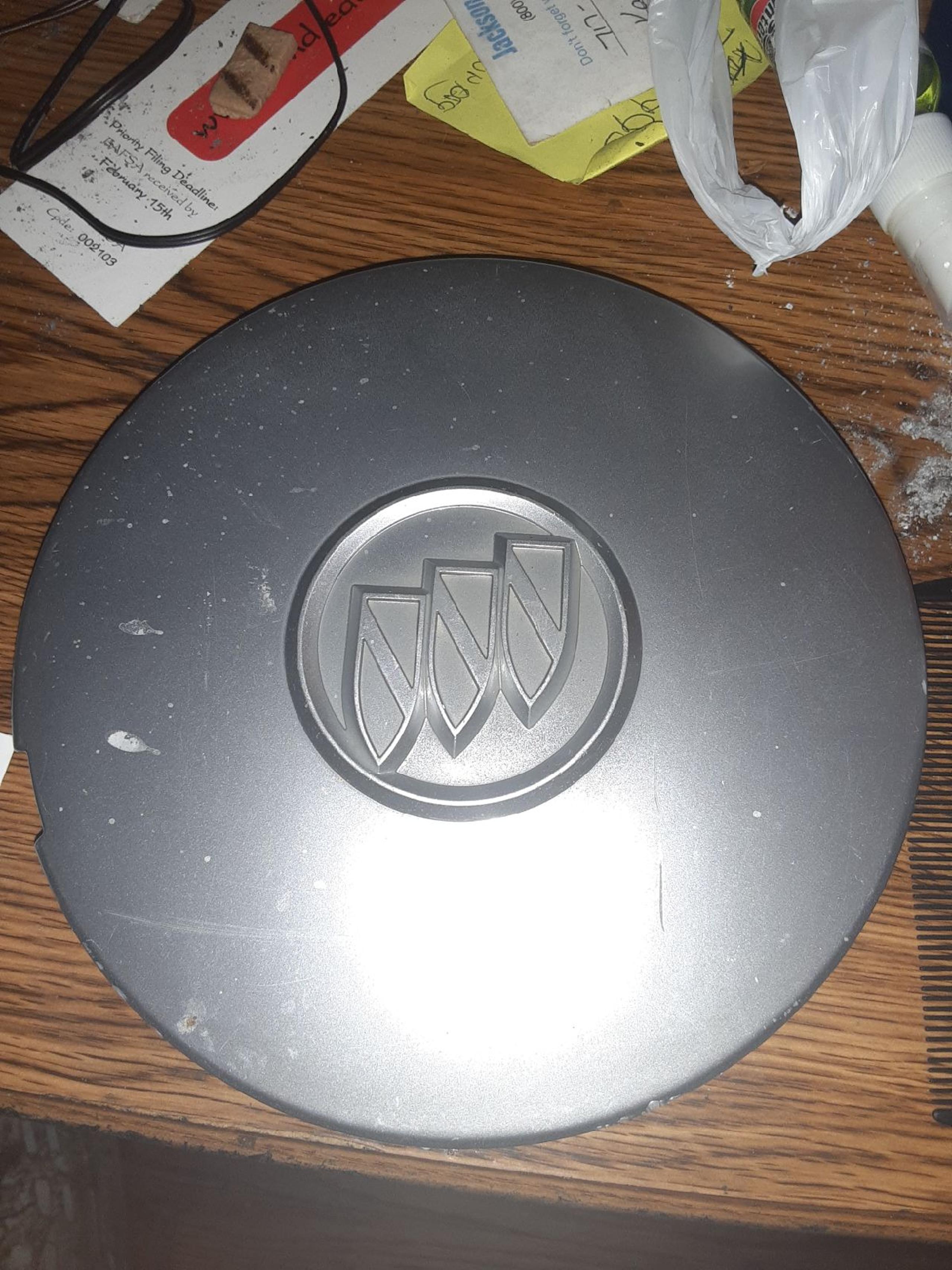 OLDSMOBILE HUBCAP FROM CRAZY ACCIDENT