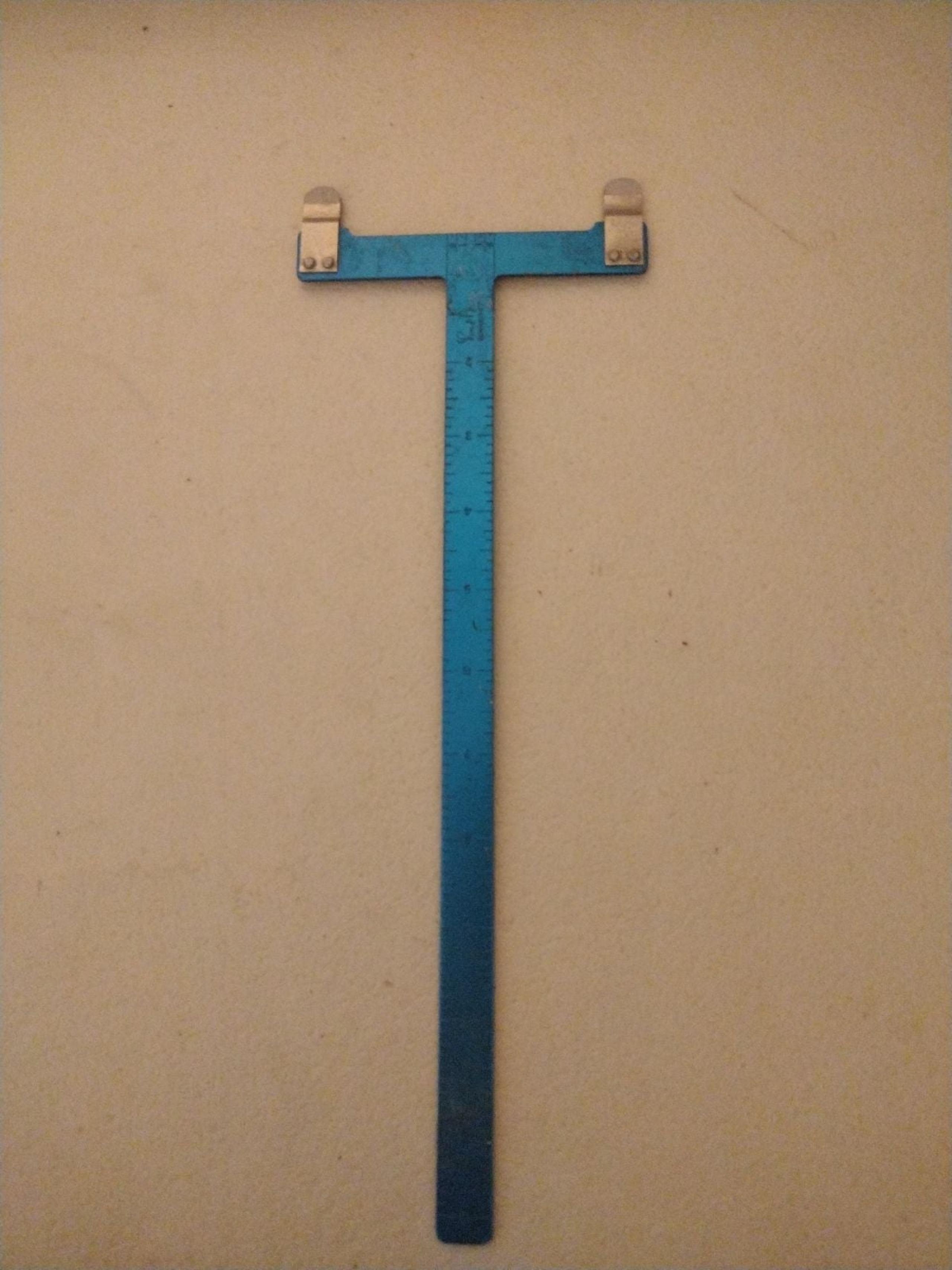 Archery bow string square