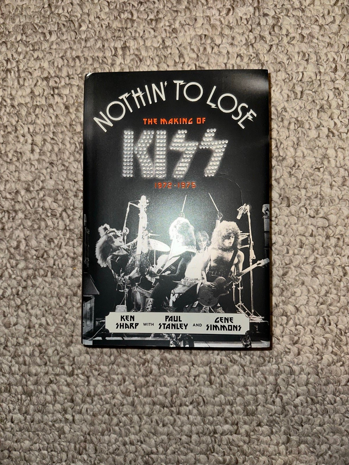 KISS autographed book