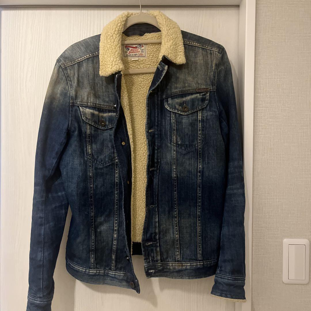 Diesel denim jacket with a fleece collar.