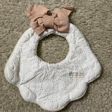 Baby girl burp cloth bib with a removable bow