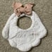 Baby girl burp cloth bib with a removable bow