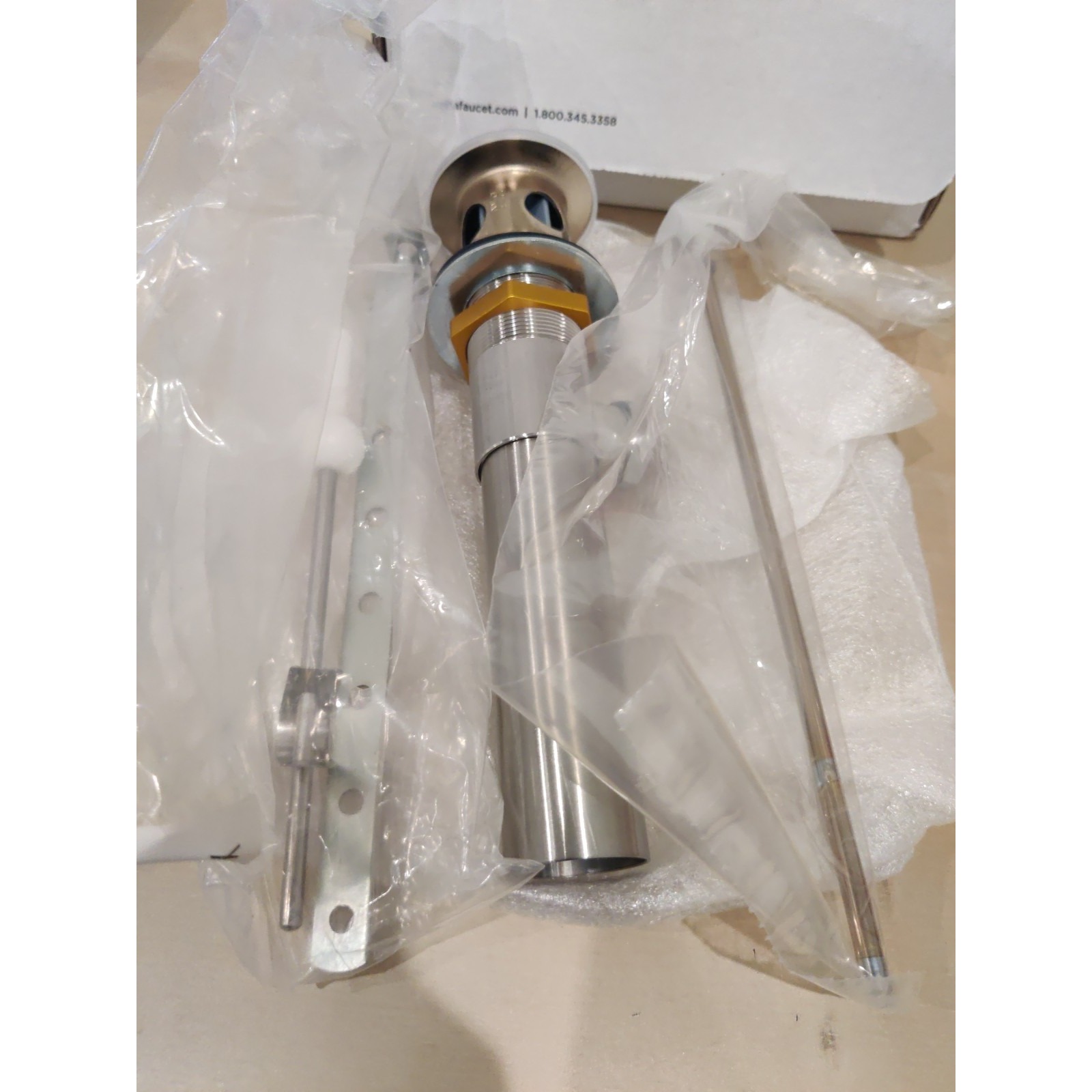 Delta Faucet RP5651CZ Metal Pop Drain Assembly, Champagne Bronze