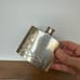 Vintage Flask, Two Sterling silver pendants