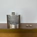 Vintage Flask, Two Sterling silver pendants