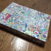 Brand new, unopened, unused Doraemon x Takashi Murakami puzzle.